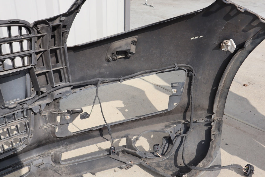 2007-2009 AUDI Q7 4L FRONT BUMPER COVER W/ GRILLE BADGE OEM