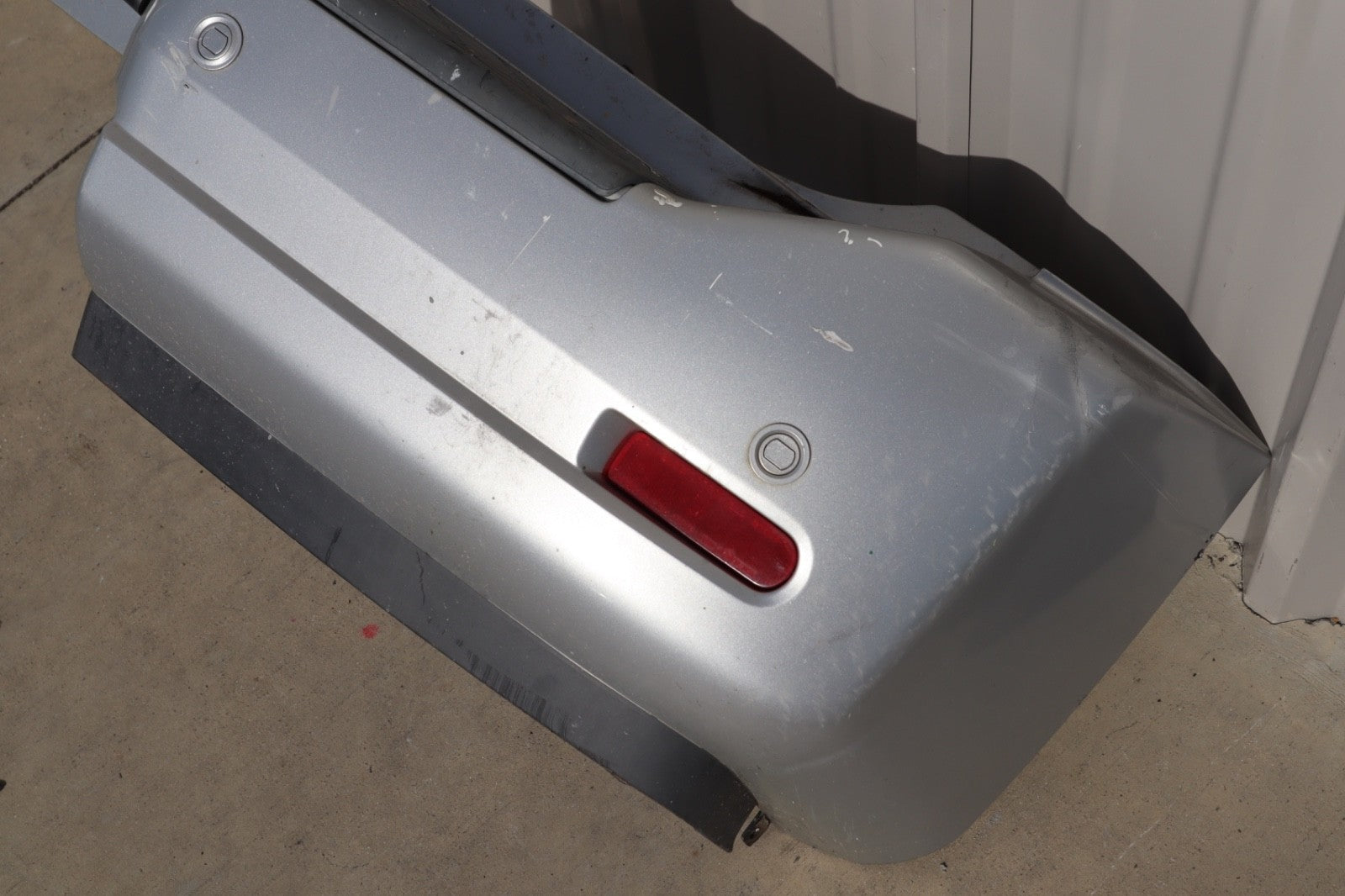 2007 Nissan Armada Rear Bumper Cover Plastic OEM