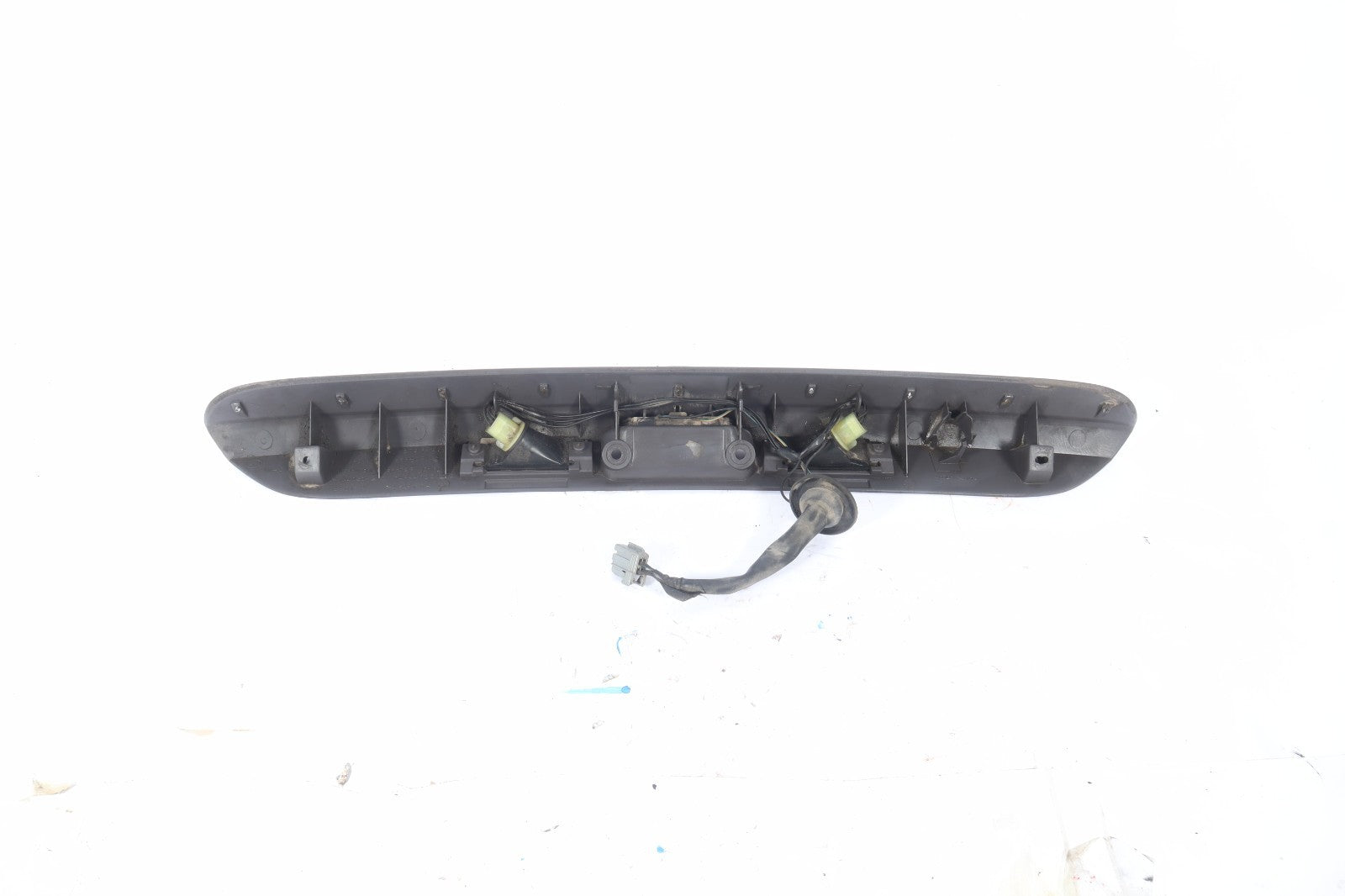 2001-2005 DODGE GRAND CARAVAN REAR LICENSE PLATE LIGHT FILLER MOULDING OEM