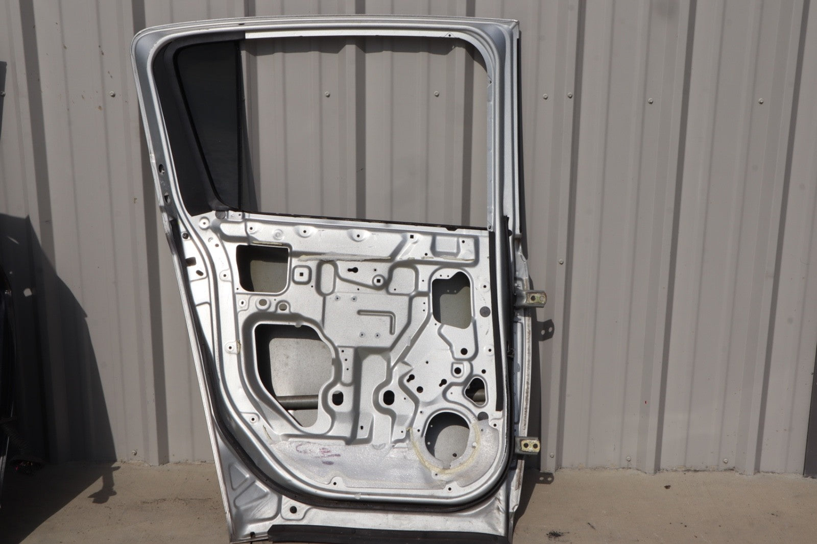 2004-2015 NISSAN ARMADA REAR LEFT DRIVER SIDE DOOR SHELL OEM
