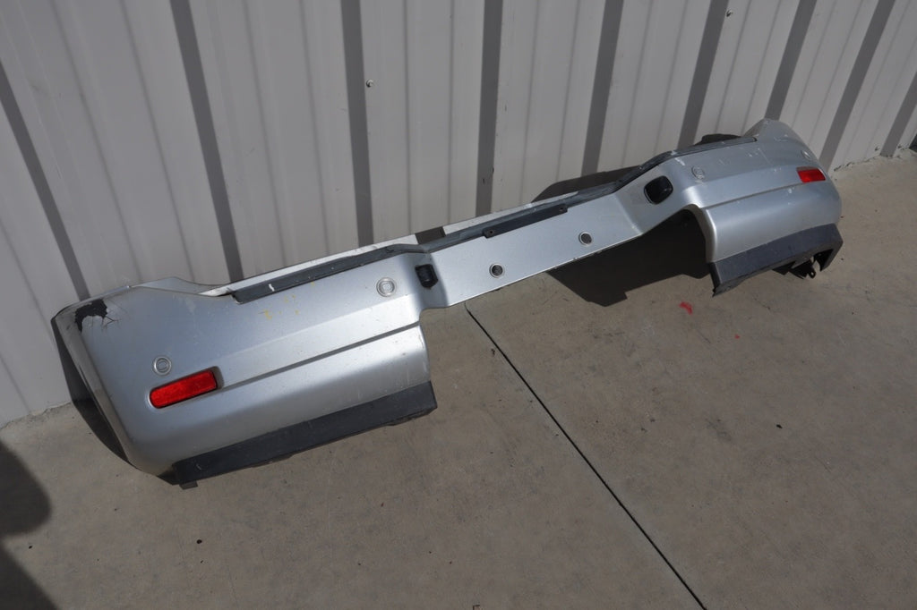 2007 Nissan Armada Rear Bumper Cover Plastic OEM