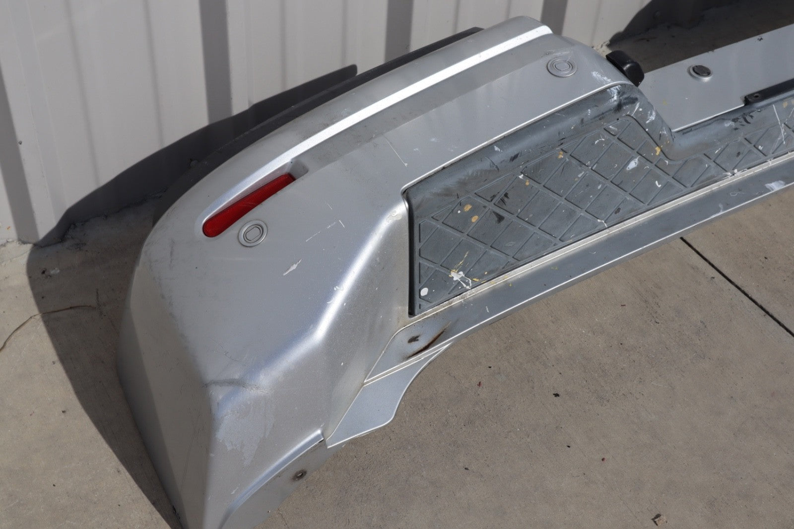 2007 Nissan Armada Rear Bumper Cover Plastic OEM