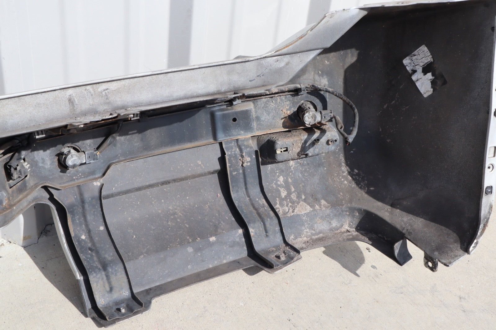2007 Nissan Armada Rear Bumper Cover Plastic OEM