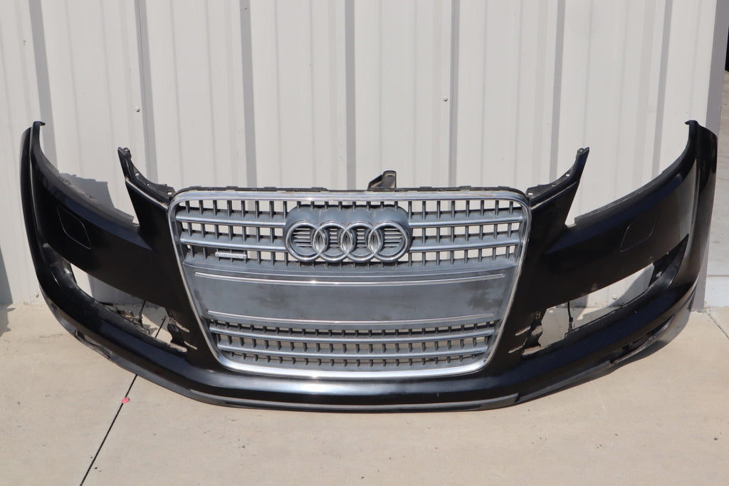 2007-2009 AUDI Q7 4L FRONT BUMPER COVER W/ GRILLE BADGE OEM