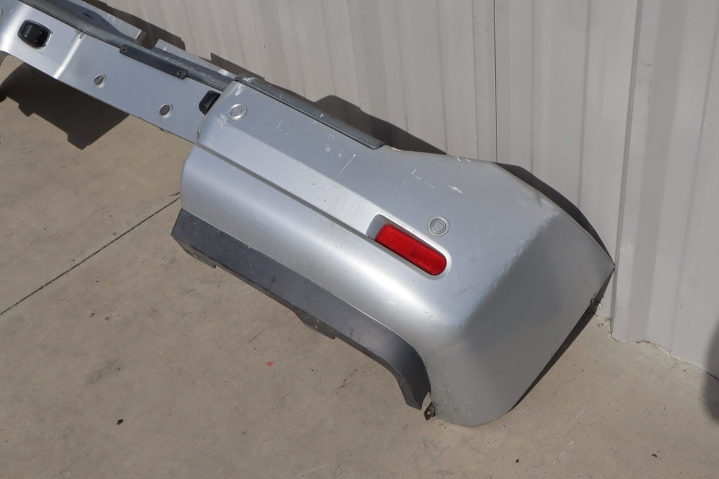 2007 Nissan Armada Rear Bumper Cover Plastic OEM