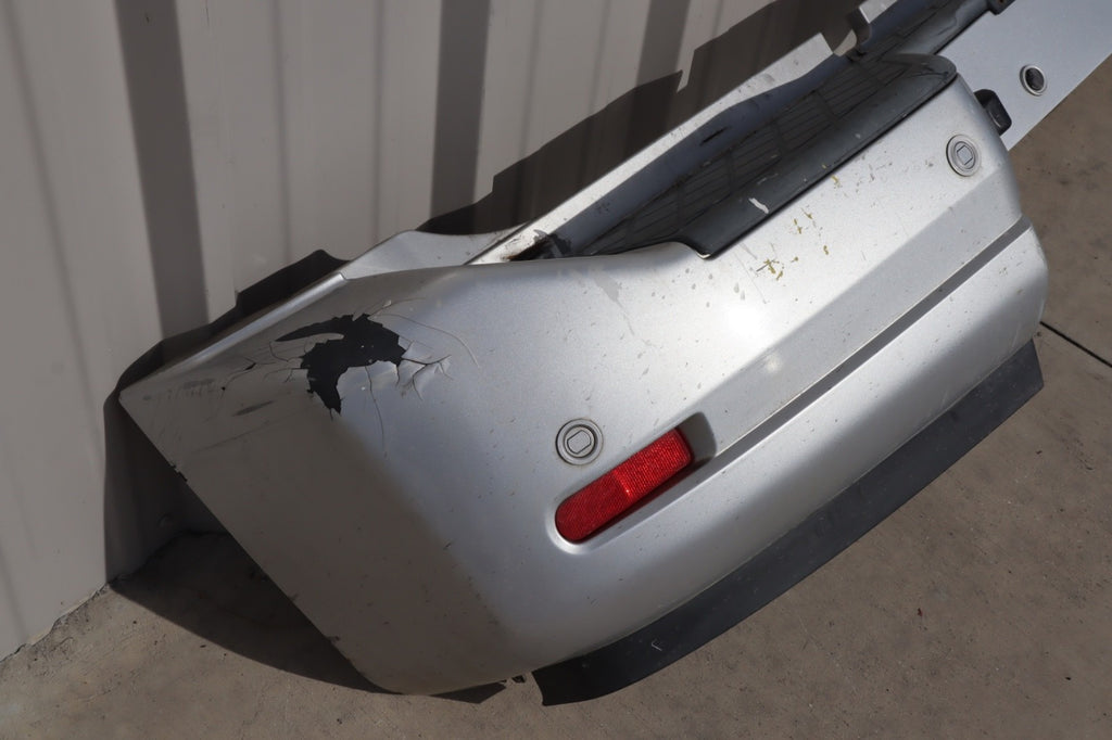 2007 Nissan Armada Rear Bumper Cover Plastic OEM