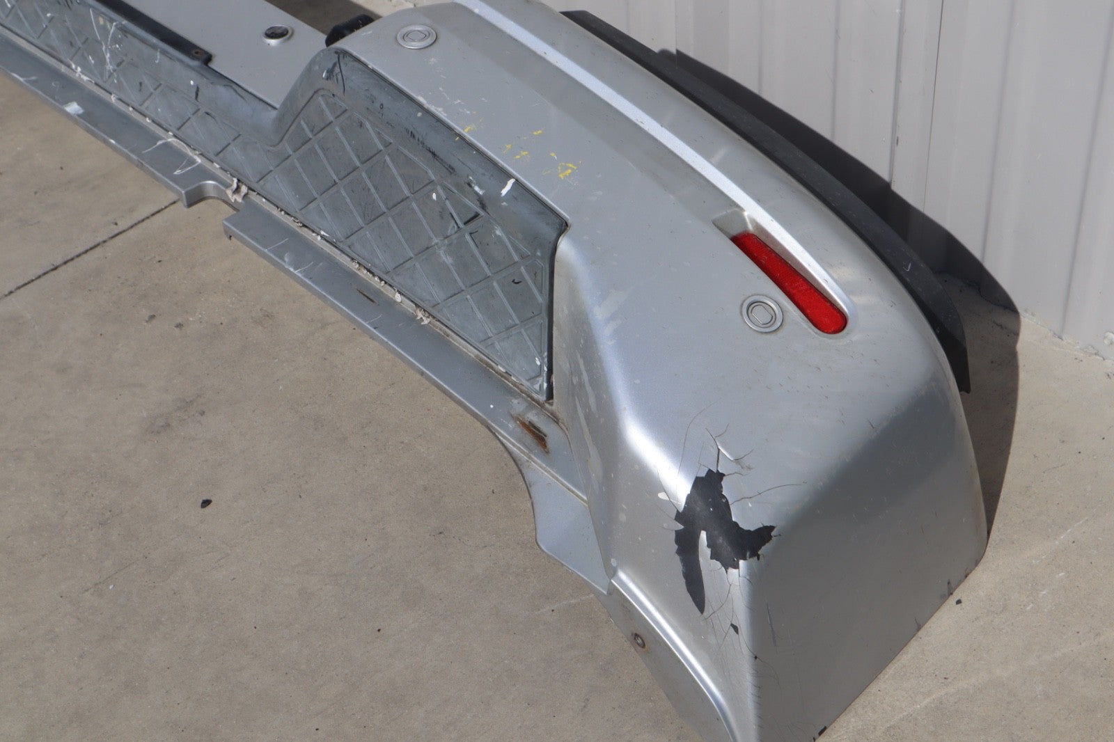 2007 Nissan Armada Rear Bumper Cover Plastic OEM