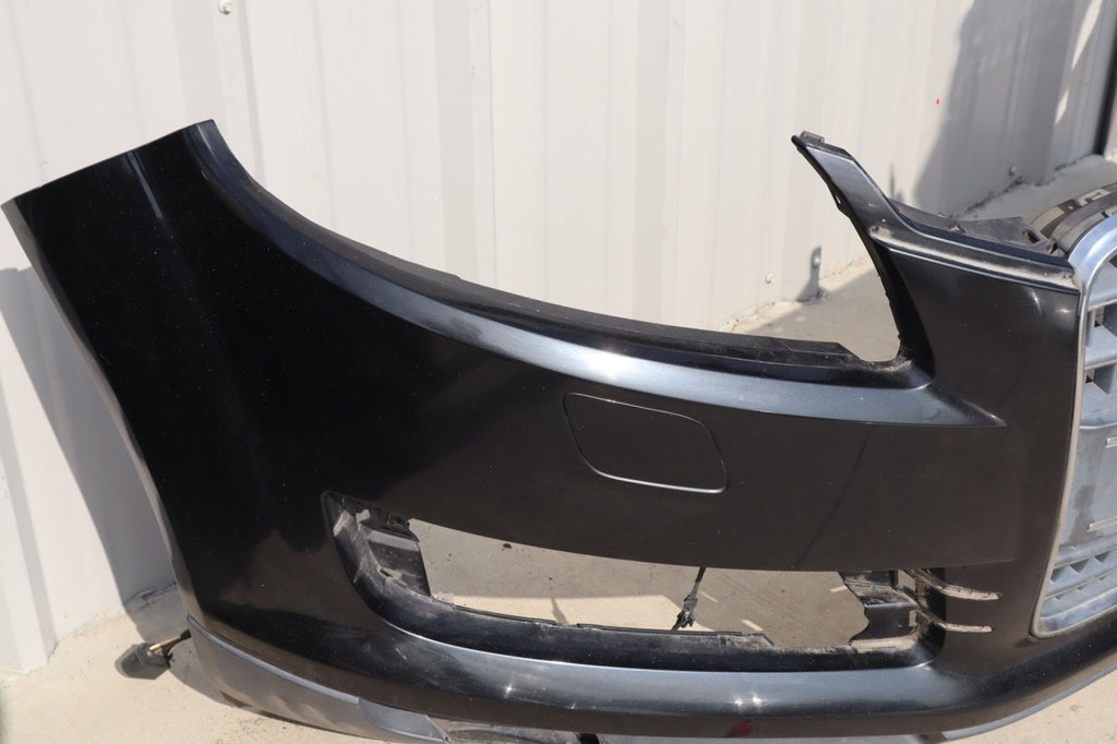 2007-2009 AUDI Q7 4L FRONT BUMPER COVER W/ GRILLE BADGE OEM