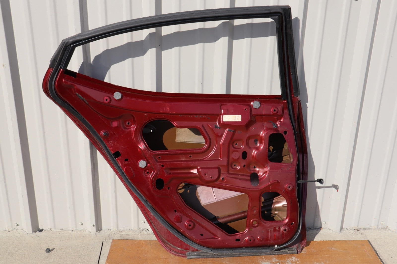2016-2019 NISSAN MAXIMA REAR LEFT SIDE DOOR SHELL COVER RED METALLIC OEM
