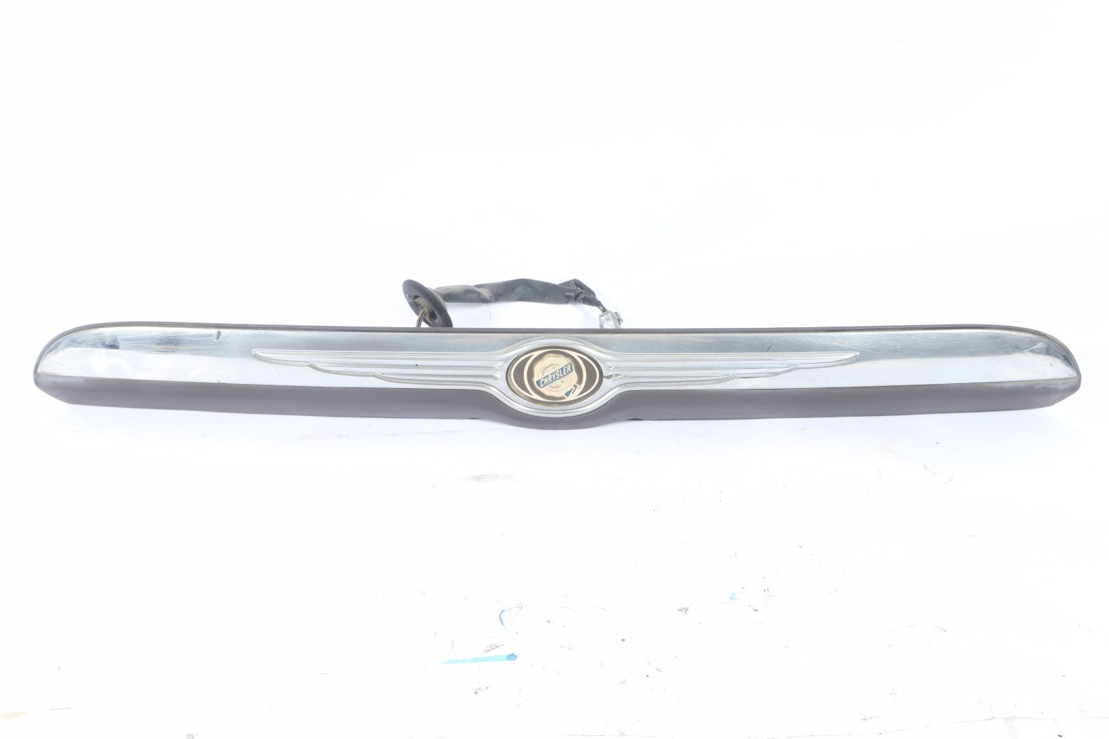 2001-2005 DODGE GRAND CARAVAN REAR LICENSE PLATE LIGHT FILLER MOULDING OEM