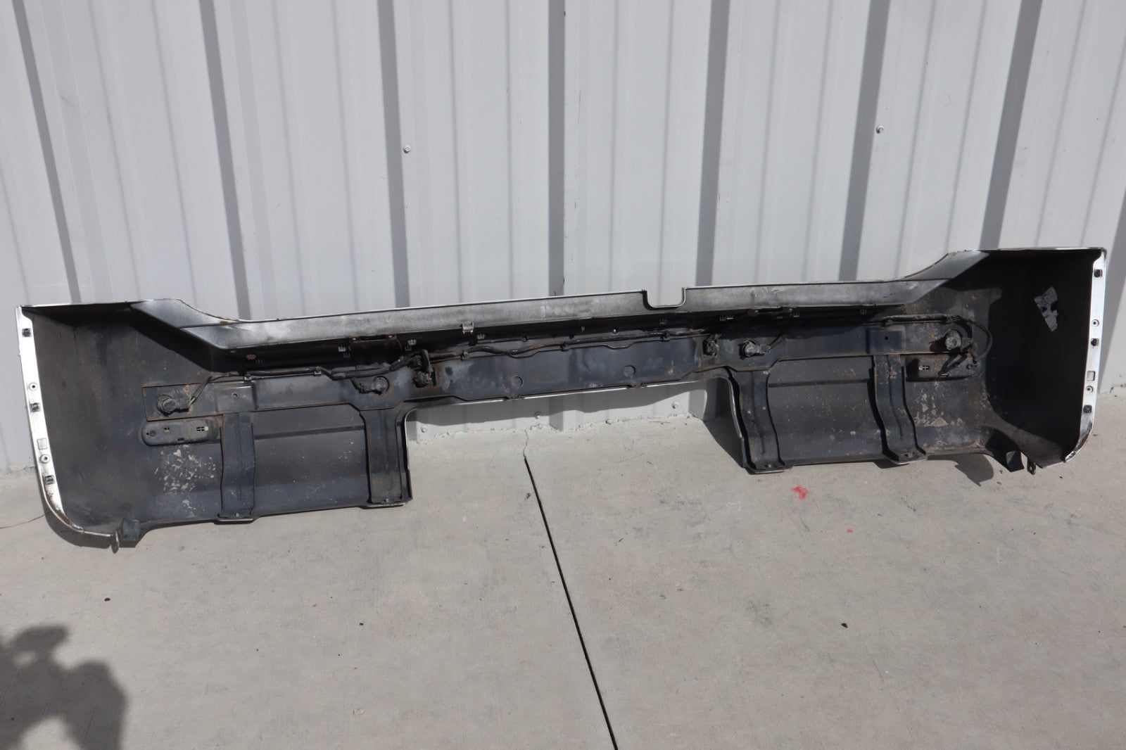 2007 Nissan Armada Rear Bumper Cover Plastic OEM