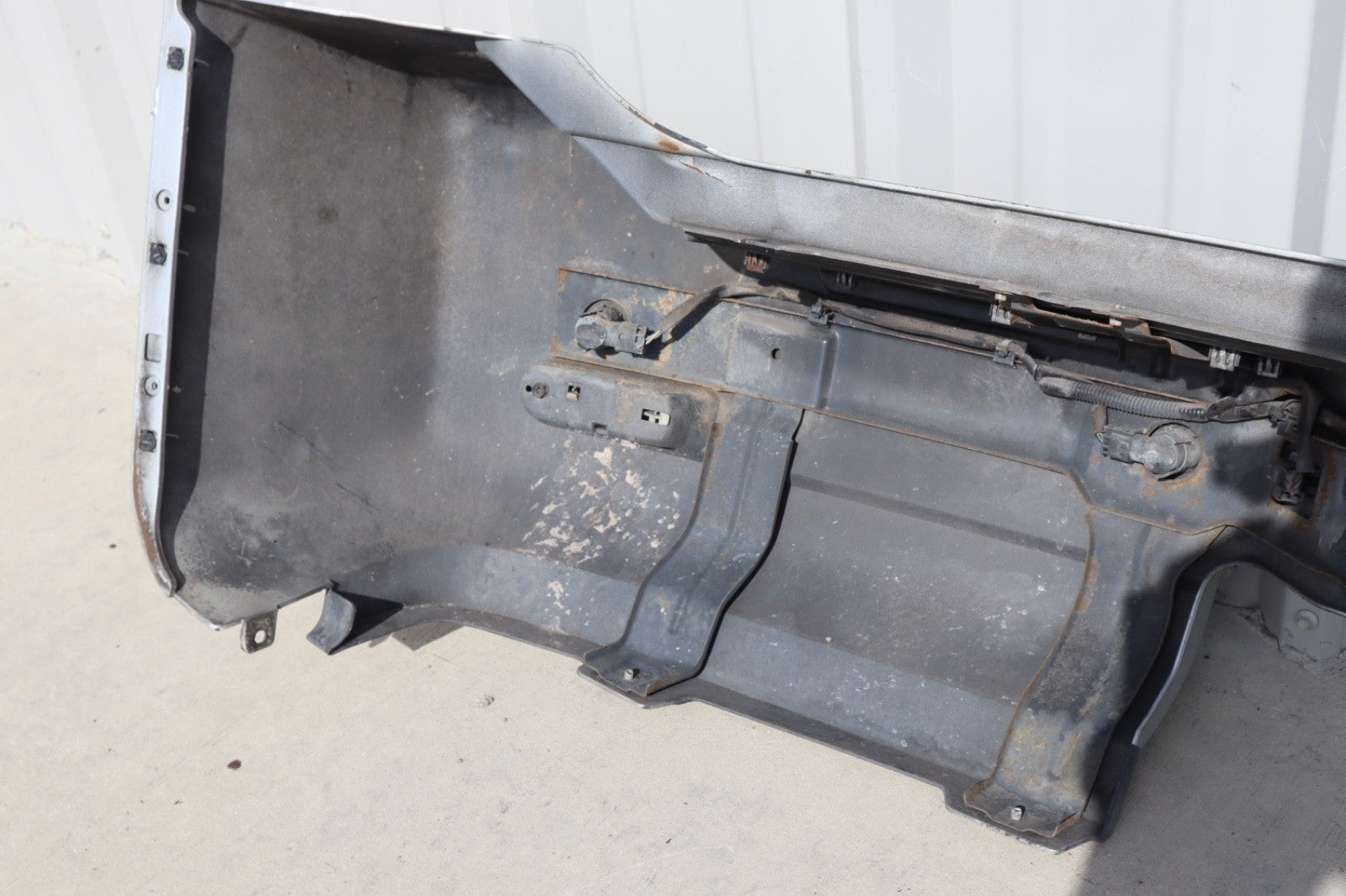 2007 Nissan Armada Rear Bumper Cover Plastic OEM