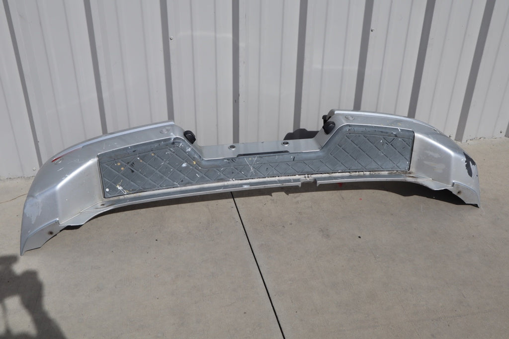 2007 Nissan Armada Rear Bumper Cover Plastic OEM